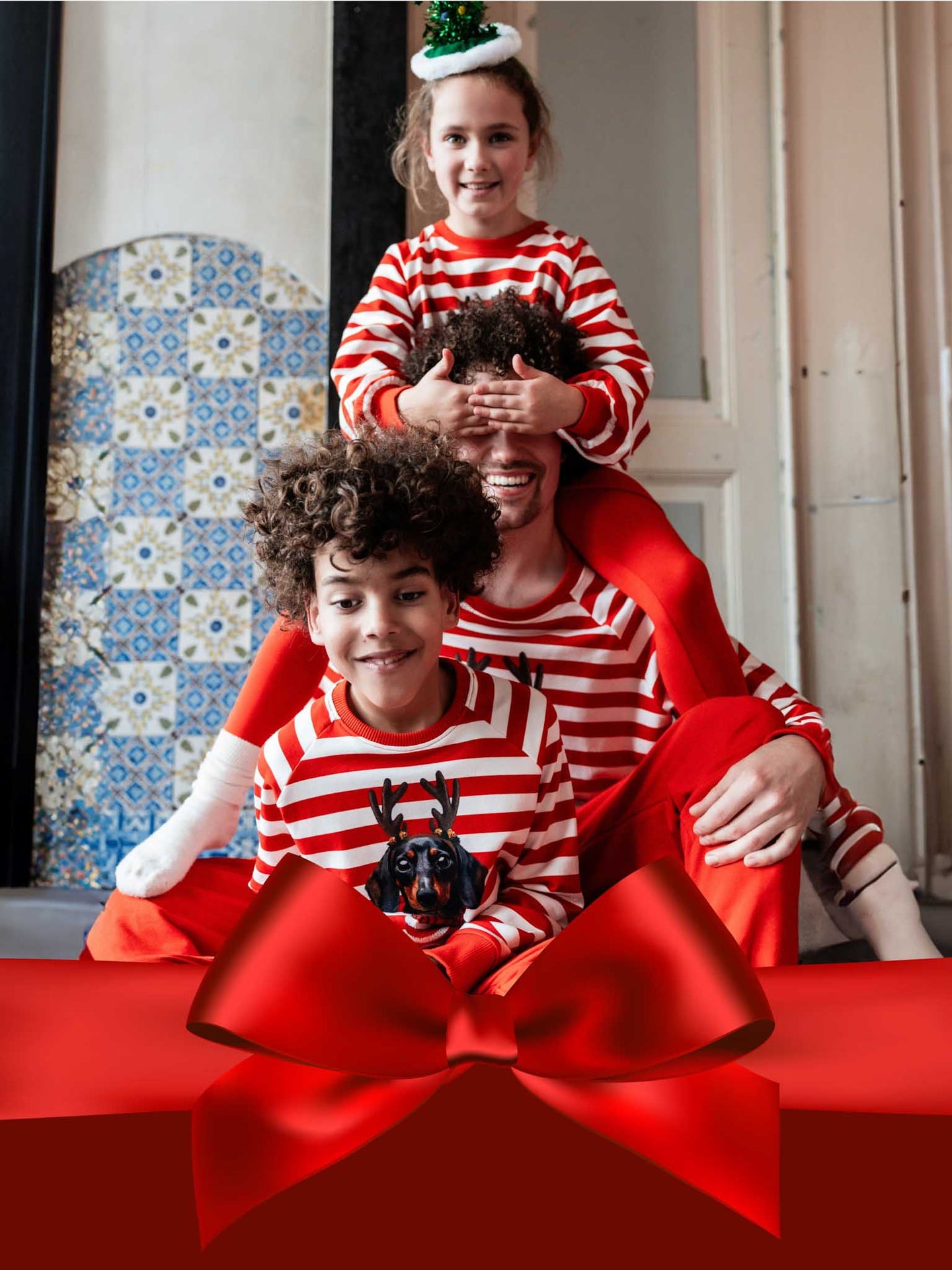 Family wearing xmas outfits